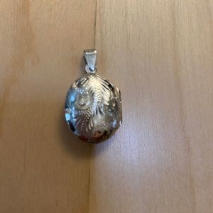 Sterling silver old fashioned locket